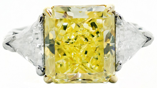 Lovely Cartier-certified 6.01-carat fancy intense yellow diamond ring. Estimate: $100,000-$200,000. A.B. Levy’s image.